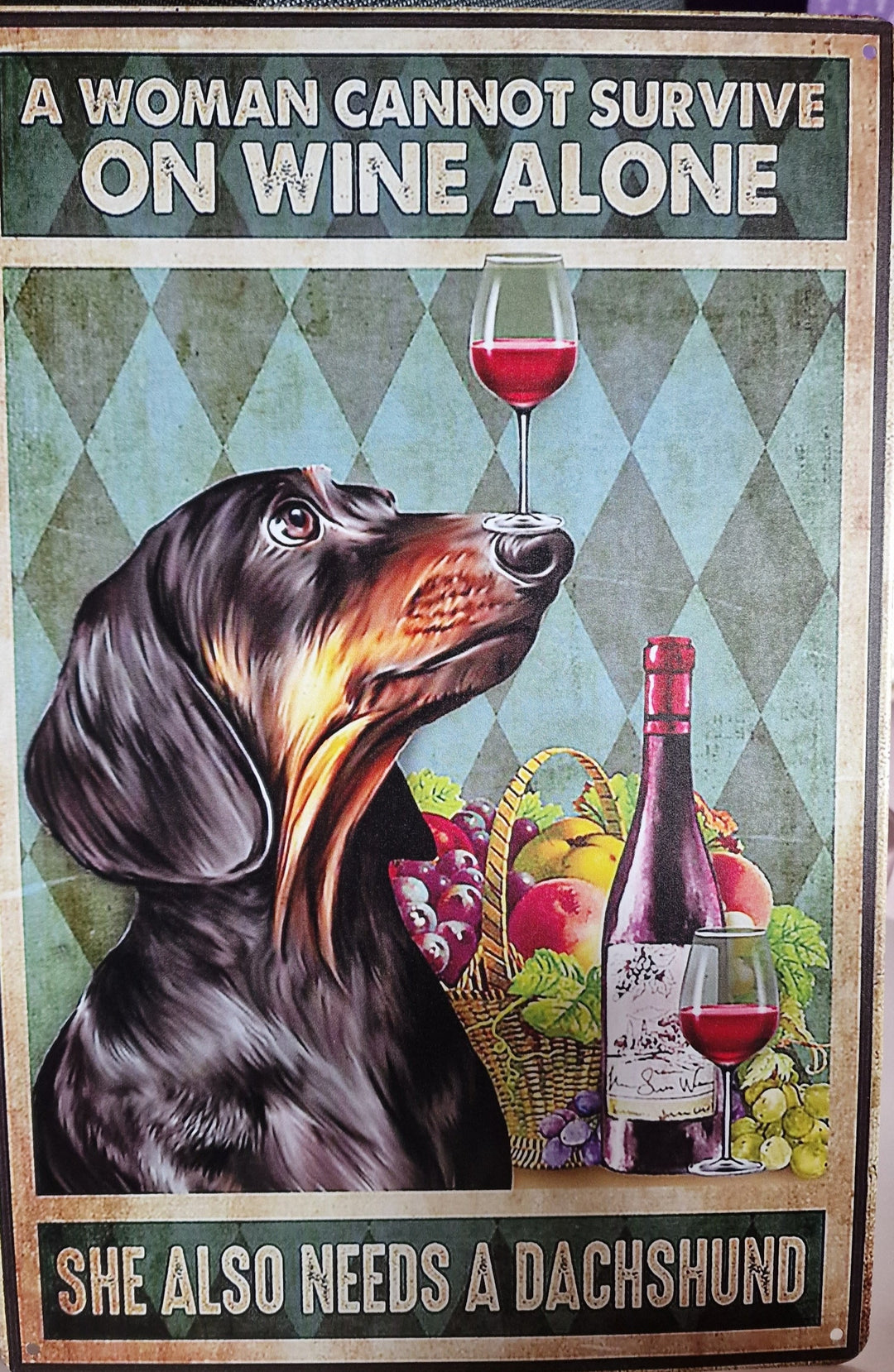 " A woman cannot survive on wine alone-she also needs a Dachshund"