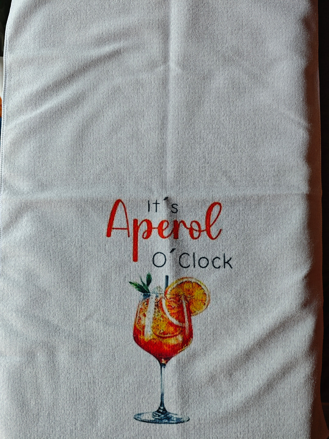 Geschirrtuch mit "Aperol o'clock"- Druck