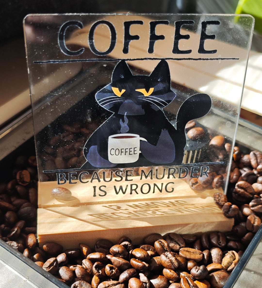 Aufstell-Schild mit Katzen-Motiv :
"Coffee....because murder is wrong"