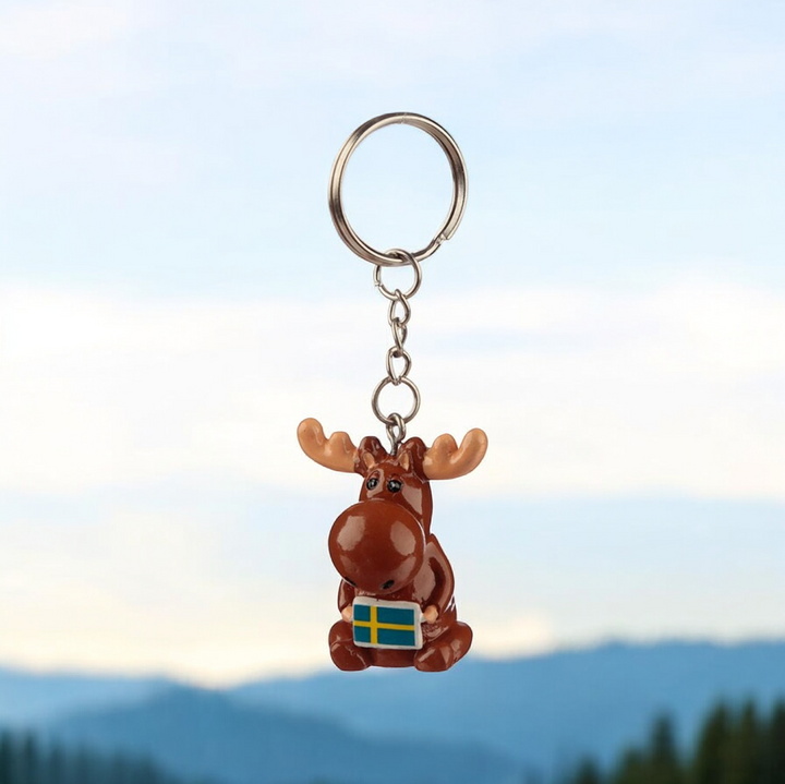 "Magnus the Moose " Elch Schlüsselanhänger, KI-Info:
Produktfoto Original
Hintergrundbild Ki-generiert