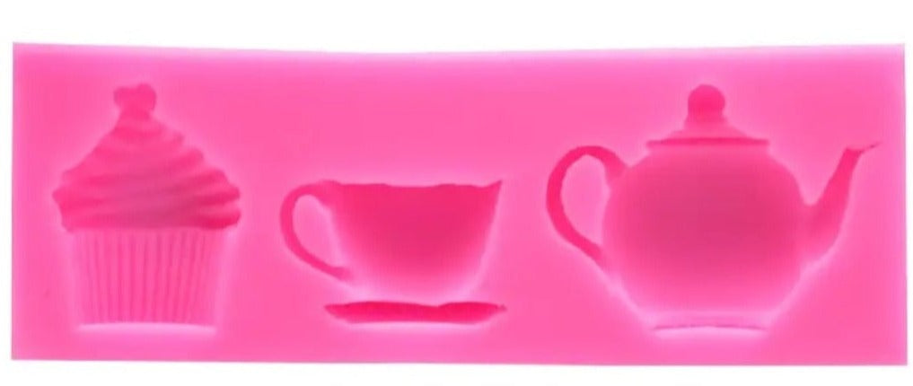 Silikon -Form zum Herstellen von Pralinen oder kleinen Schokoladen. Mit 3 Motiven ( Cupcake, Teetasse. Teekanne)  