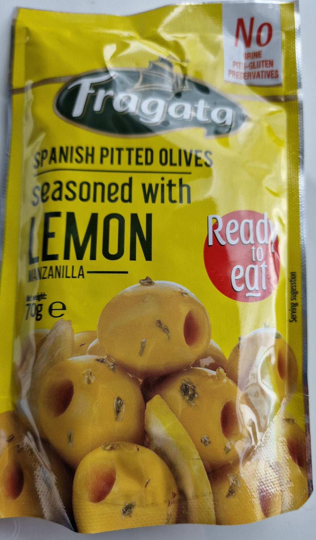 Fragata , grüne spanische Oliven ohne Stein, mit Zitrone und Olivenöl