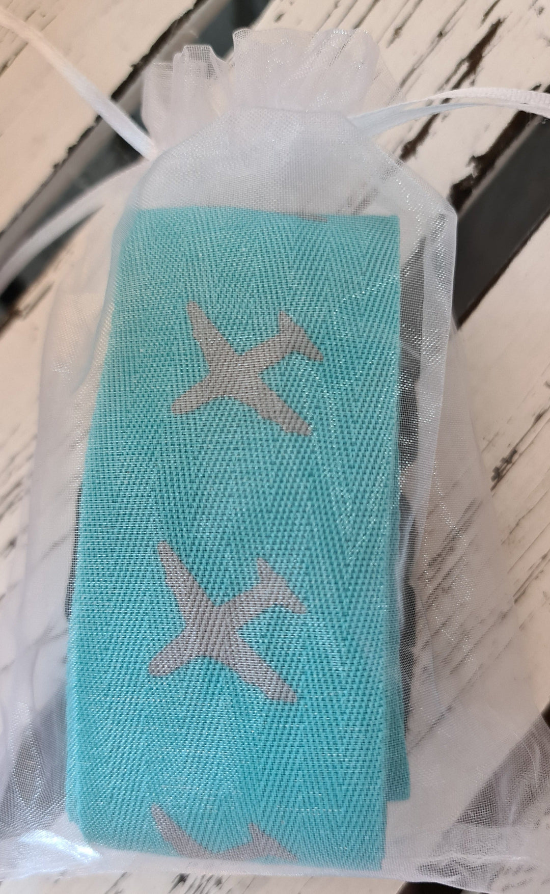 Koffergurt, türkis mit Flugzeugen, verstellbar - British Moments / Fernweh-Kaufhaus