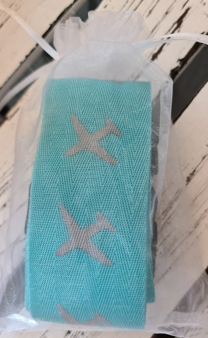 Koffergurt, türkis mit Flugzeugen, verstellbar - British Moments / Fernweh-Kaufhaus