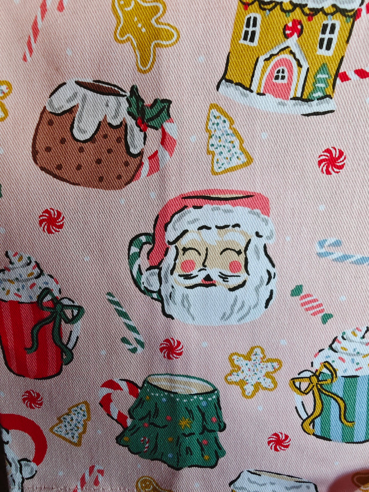 Ulster Weavers Geschirrtücher 3er Set  mit  Weihnachts - Motiven, rosa. Nahaufnahme Stoff