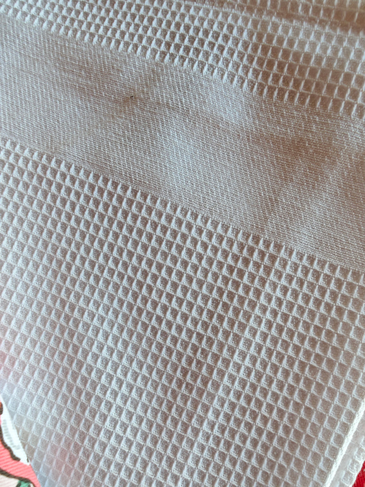 Ulster Weavers Geschirrtücher 3er Set  mit  Weihnachts - Motiven, rosa. Nahaufnahme Stoff