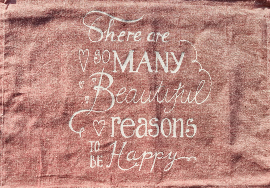 Tisch-Set , rosa" There are so many beautiful reasons to be happy"  100 % Baumwolle   34cm  x 48 cm