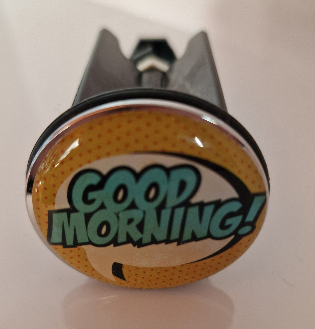 Waschbecken -Stöpsel gelb mit grüner Beschriftung " Good Morning! "