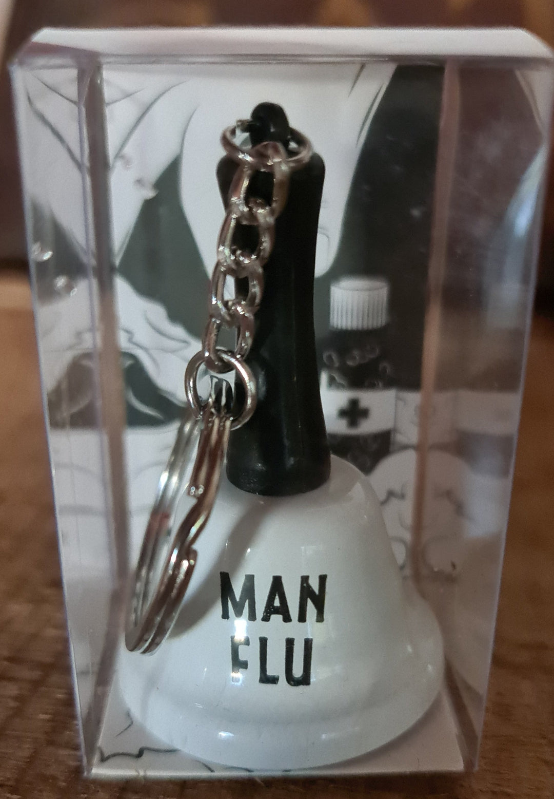 Schlüsselanhänger Mini Glocke "Man Flu " , weiß/schwarz - British Moments