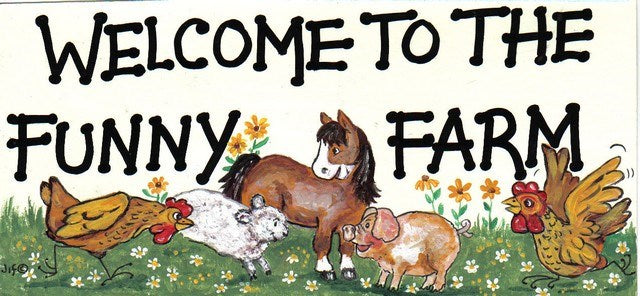 Schild : " Welcome to the funny farm " - British Moments